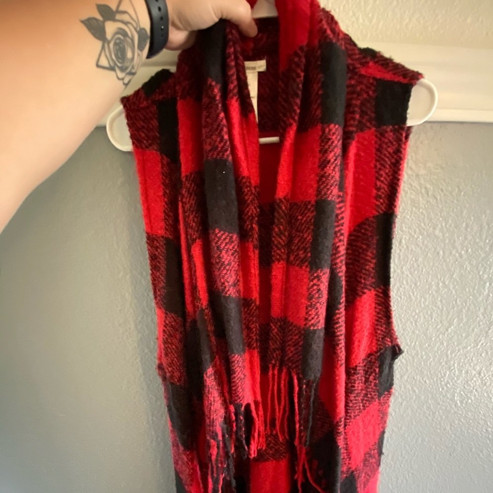 Adorable flannel vest with fringe